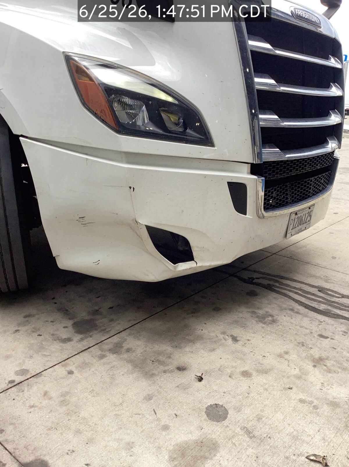 Vehicle body panel photo showing a dent, as reviewed in the 360AI Damage Review dashboard