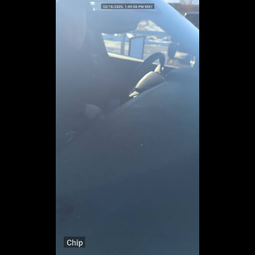 Windscreen with a small glass chip, photographed during a vehicle inspection