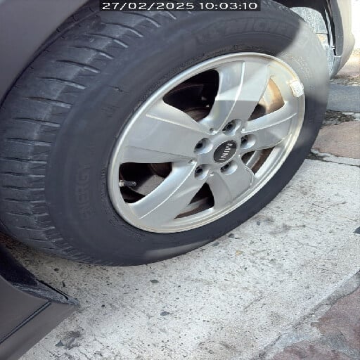 Tyre with an embedded nail, photographed during a vehicle inspection